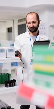 portrait-pharmacist-checking-medication-list